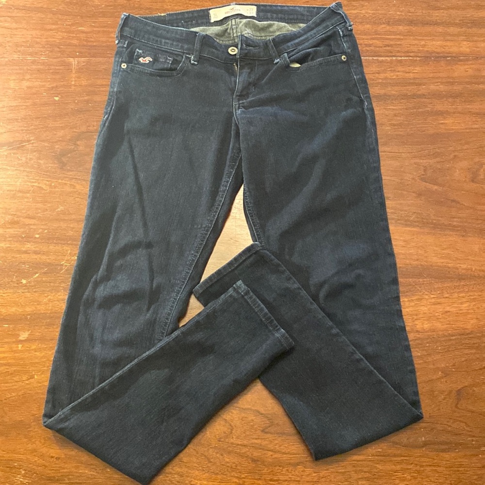 Hollister women’s jeans W27L33 blue zipper front w/button design on back pockets